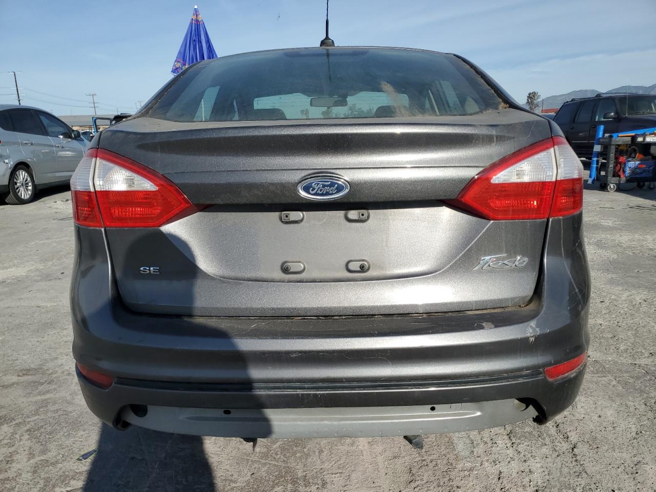 2015 Ford Fiesta VIN 3FADP4BJ8FM133546 Copart auction photo, minor dent/scratches / damage history damage thumbnail 6