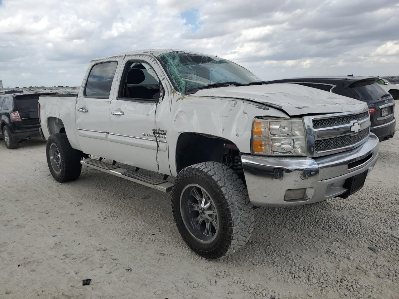 2013 Chevrolet Silverado VIN 3GCPCSE00DG147981 Copart auction photo, rollover damage thumbnail 4