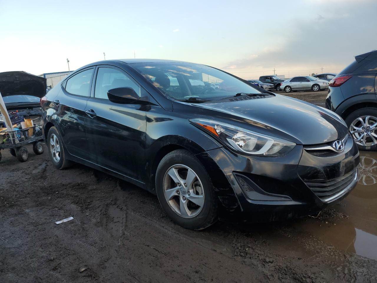 2015 Hyundai Elantra VIN 5NPDH4AEXFH585256 Copart auction photo, vandalism damage thumbnail 4