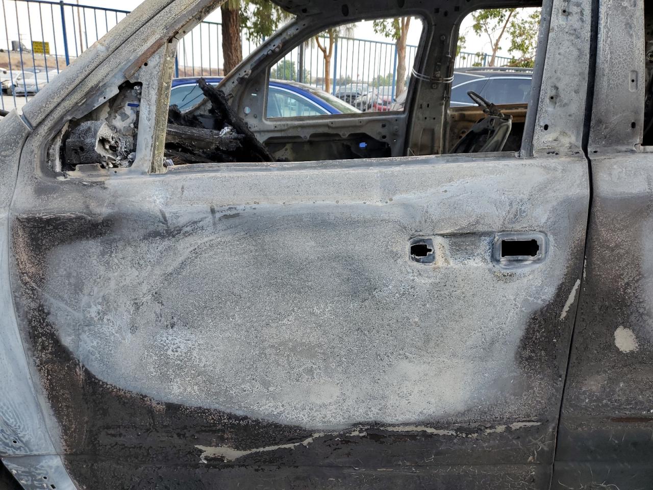 2020 RAM 1500 VIN 1C6SRFJMXLN250010 Copart auction photo, burn damage thumbnail 7