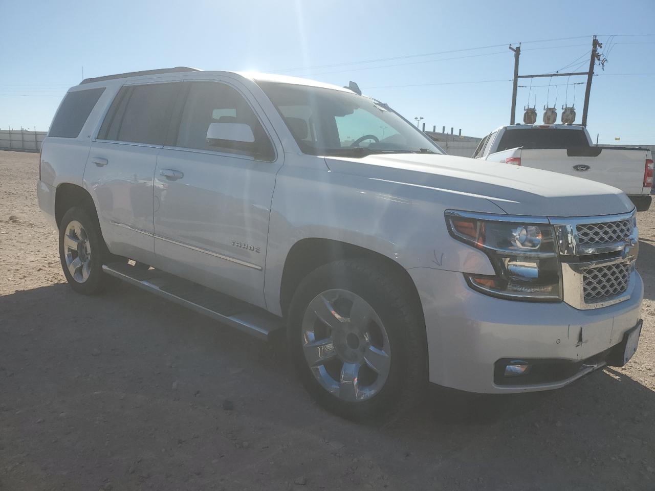 2017 Chevrolet Tahoe VIN 1GNSCBKCXHR388677 Copart auction photo, vandalism / all over damage thumbnail 4
