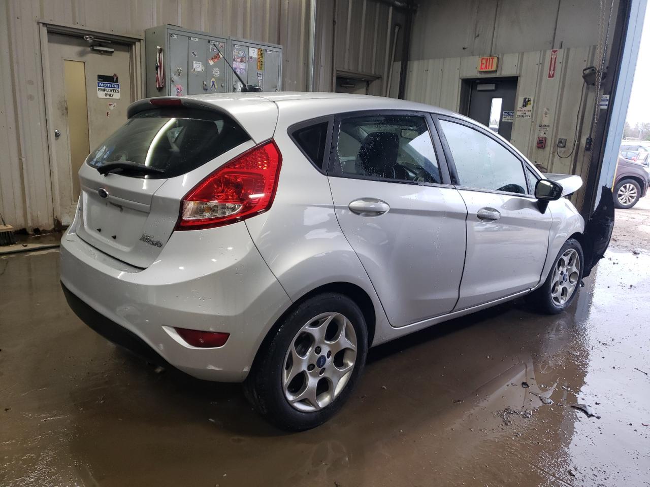 2012 Ford Fiesta VIN 3FADP4FJ6CM102057 Copart auction photo, front end damage thumbnail 3