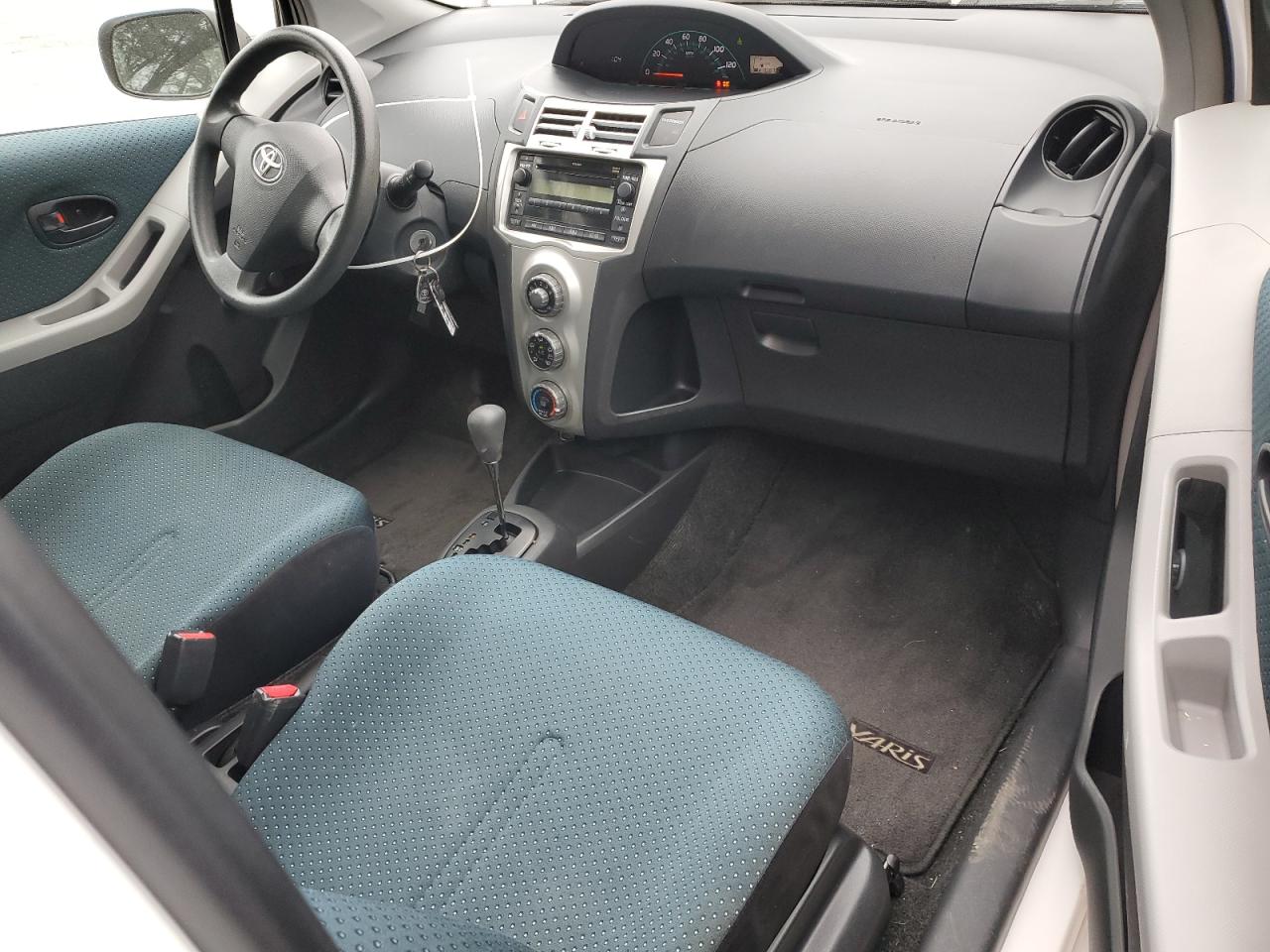 2007 Toyota Yaris VIN JTDJT923075047369 Copart auction photo, side damage thumbnail 8