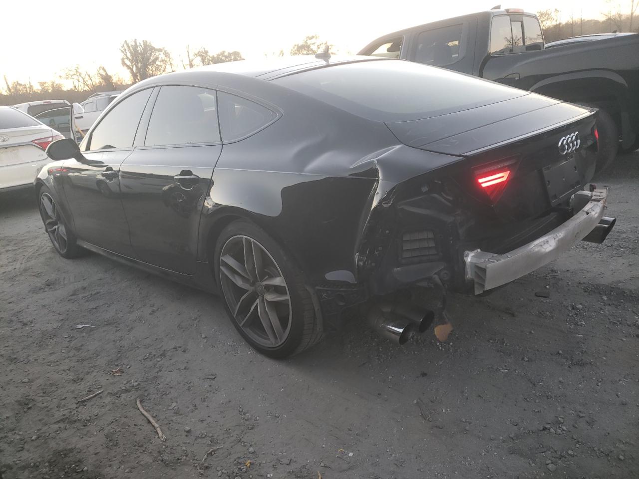 2016 Audi A7 VIN WAU2GAFC5GN048101 Copart auction photo, rear end / minor dent/scratches damage thumbnail 2