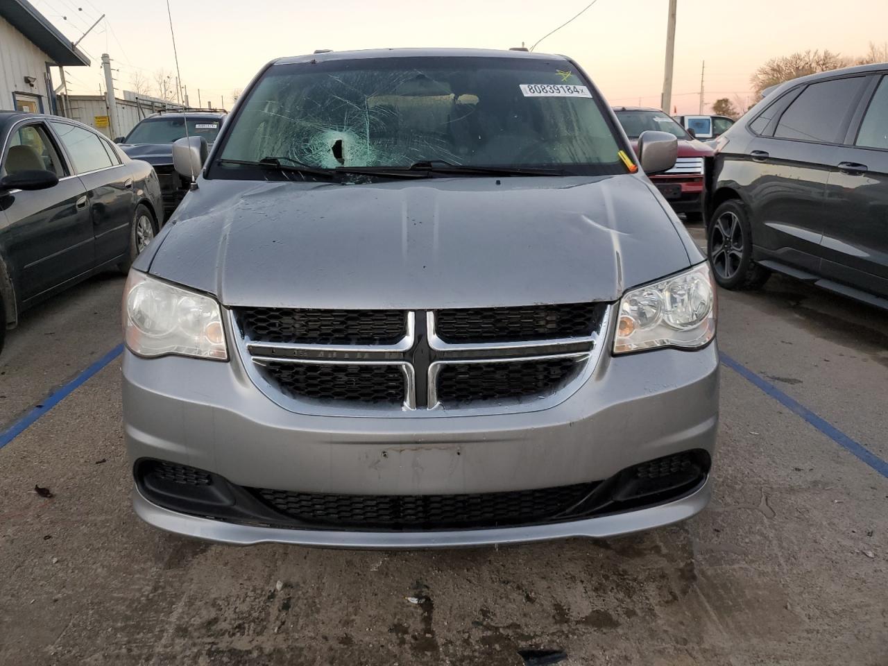 2016 Dodge Caravan VIN 2C4RDGCG0GR317760 Copart auction photo, front end / side damage thumbnail 5