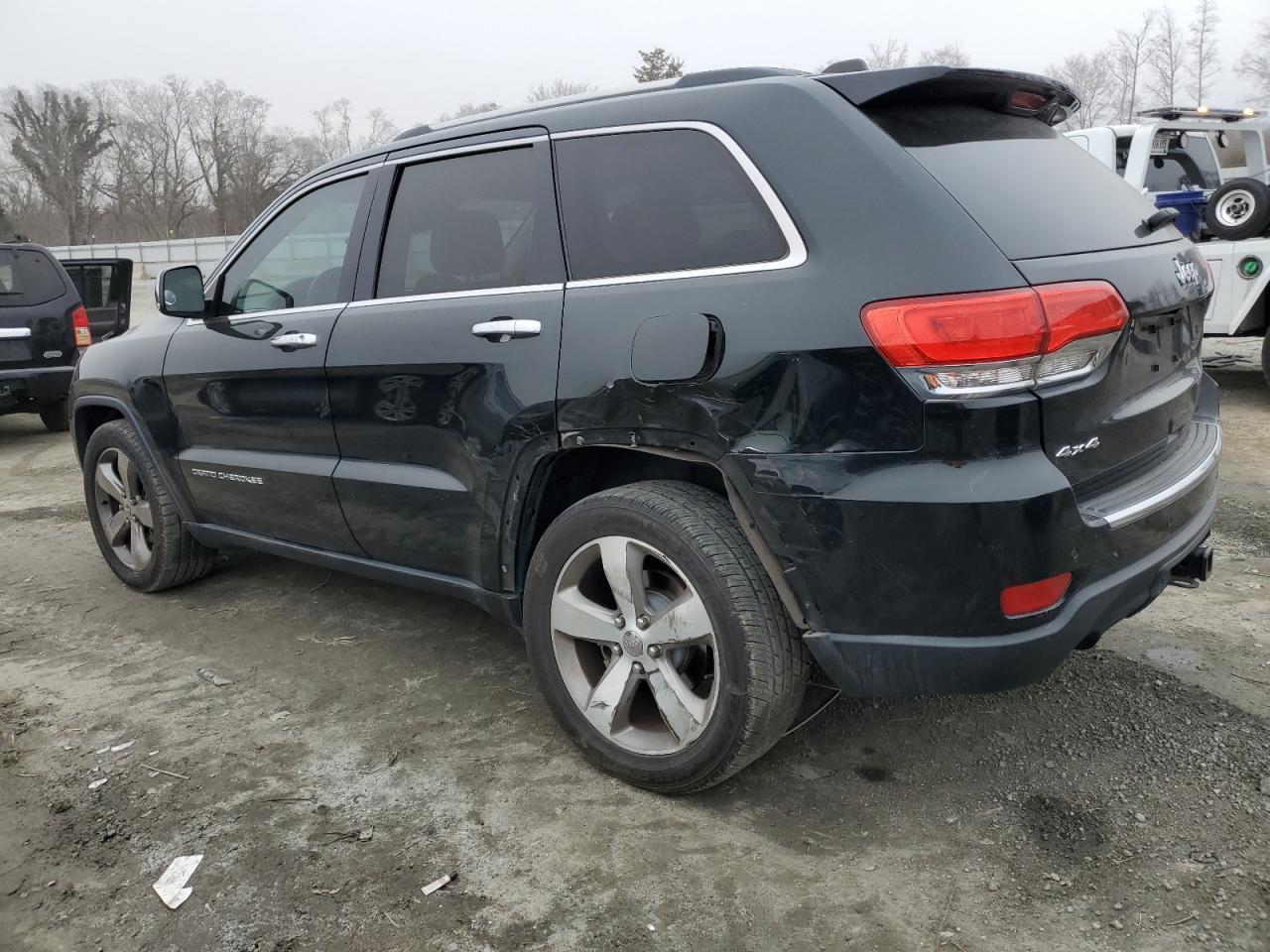 2014 Jeep Grand Cherokee VIN 1C4RJFBG4EC431707 Copart auction photo, side damage thumbnail 2