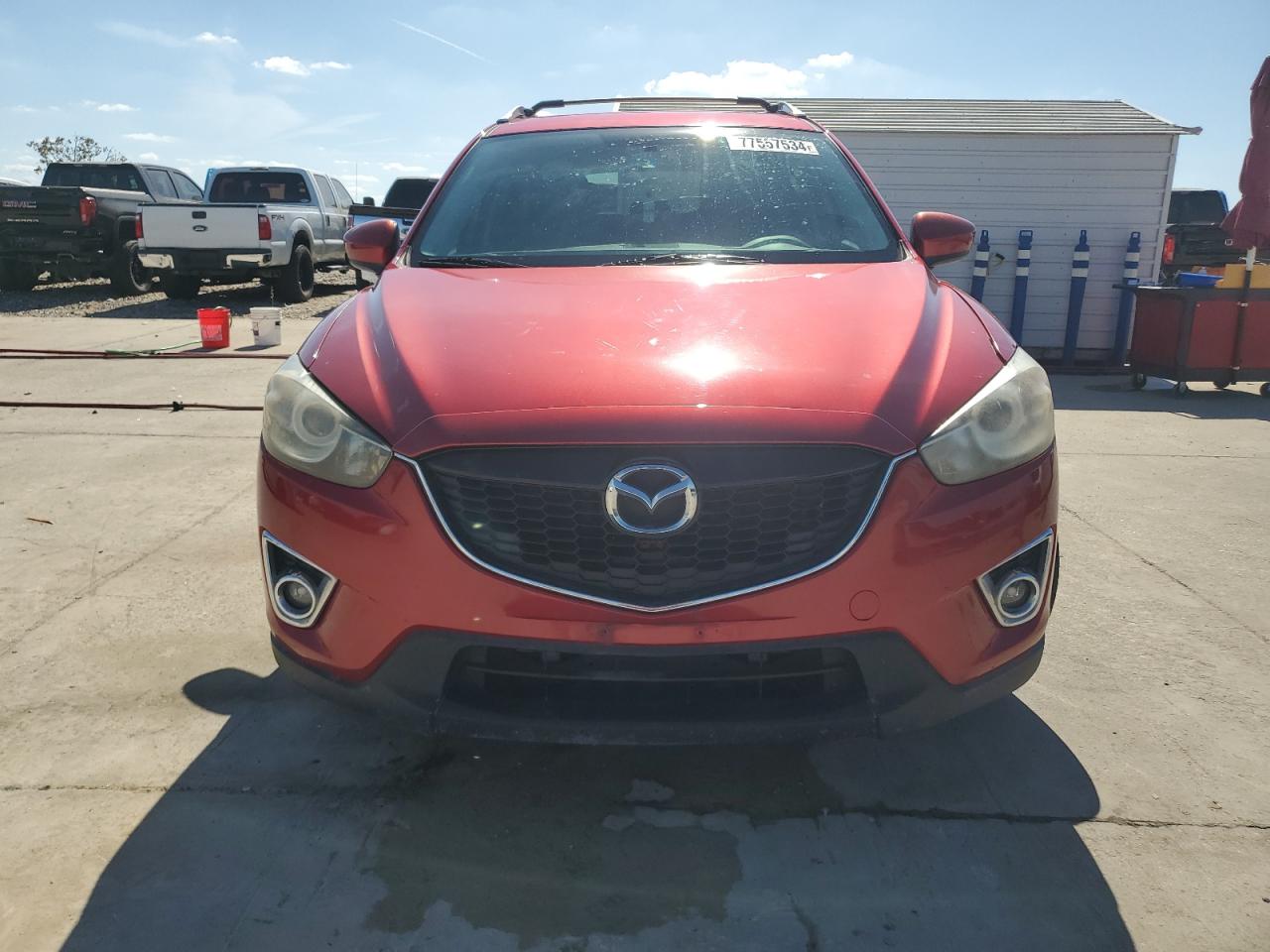2014 Mazda CX-5 VIN JM3KE2CY9E0323520 Copart auction photo, undercarriage / minor dent/scratches damage thumbnail 5