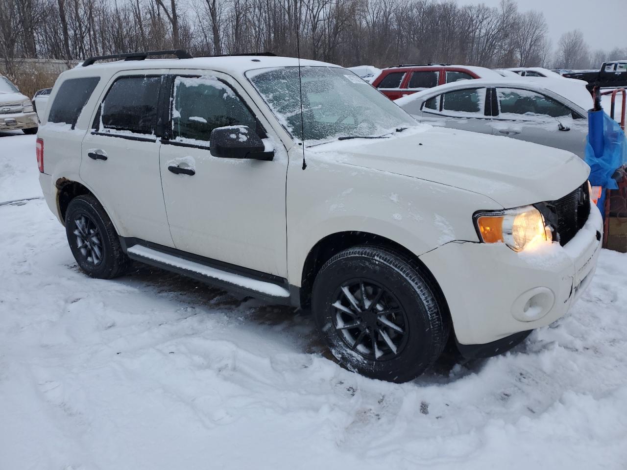 2011 Ford Escape VIN 1FMCU9DG1BKA67691 Copart auction photo, front end / minor dent/scratches damage thumbnail 4