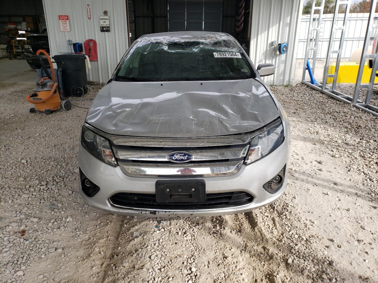 2011 Ford Fusion VIN 3FAHP0HA4BR127371 Copart auction photo, rollover damage thumbnail 5
