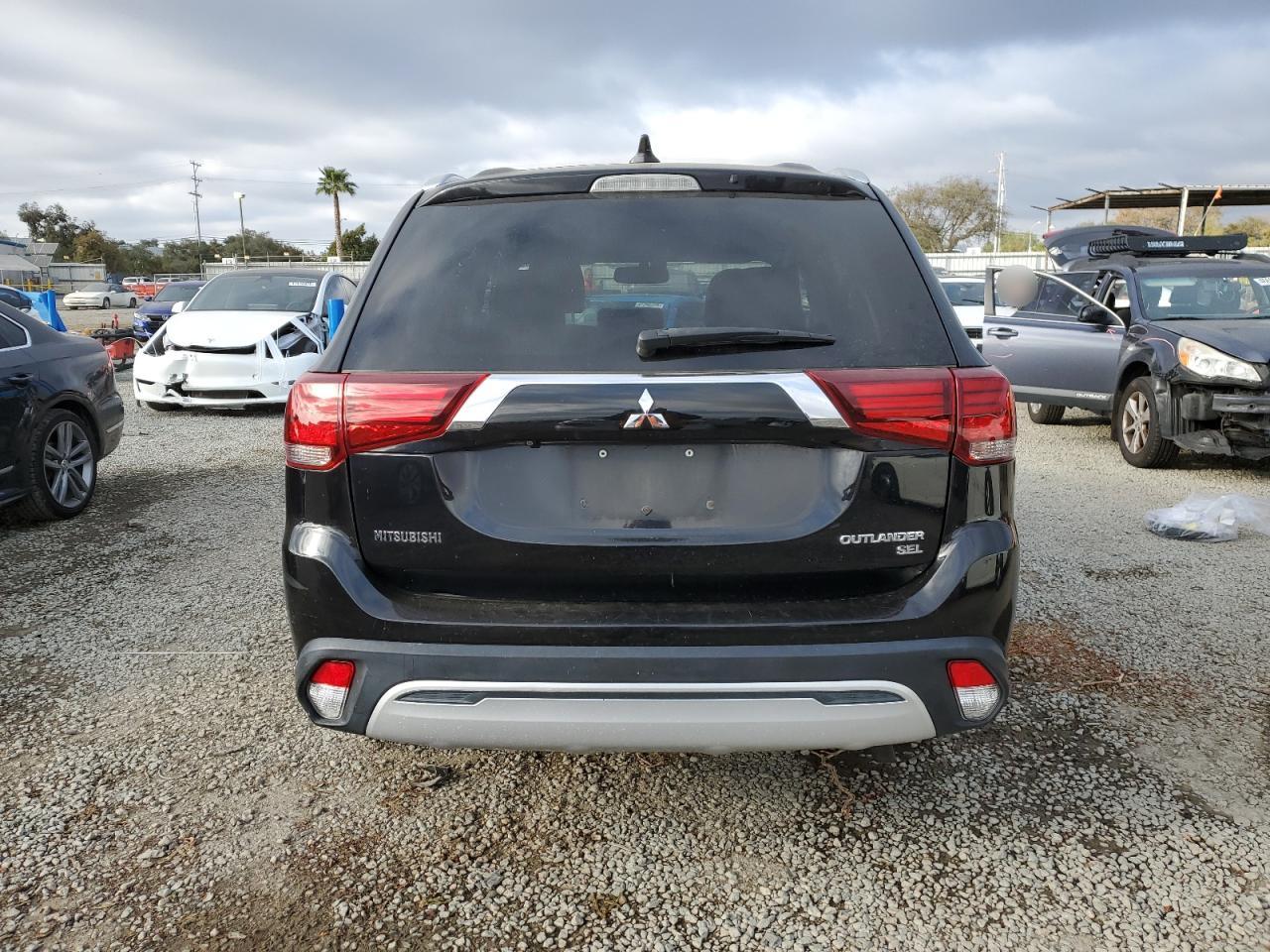 2019 Mitsubishi Outlander VIN JA4AD3A3XKZ025063 Copart auction photo, side damage thumbnail 6
