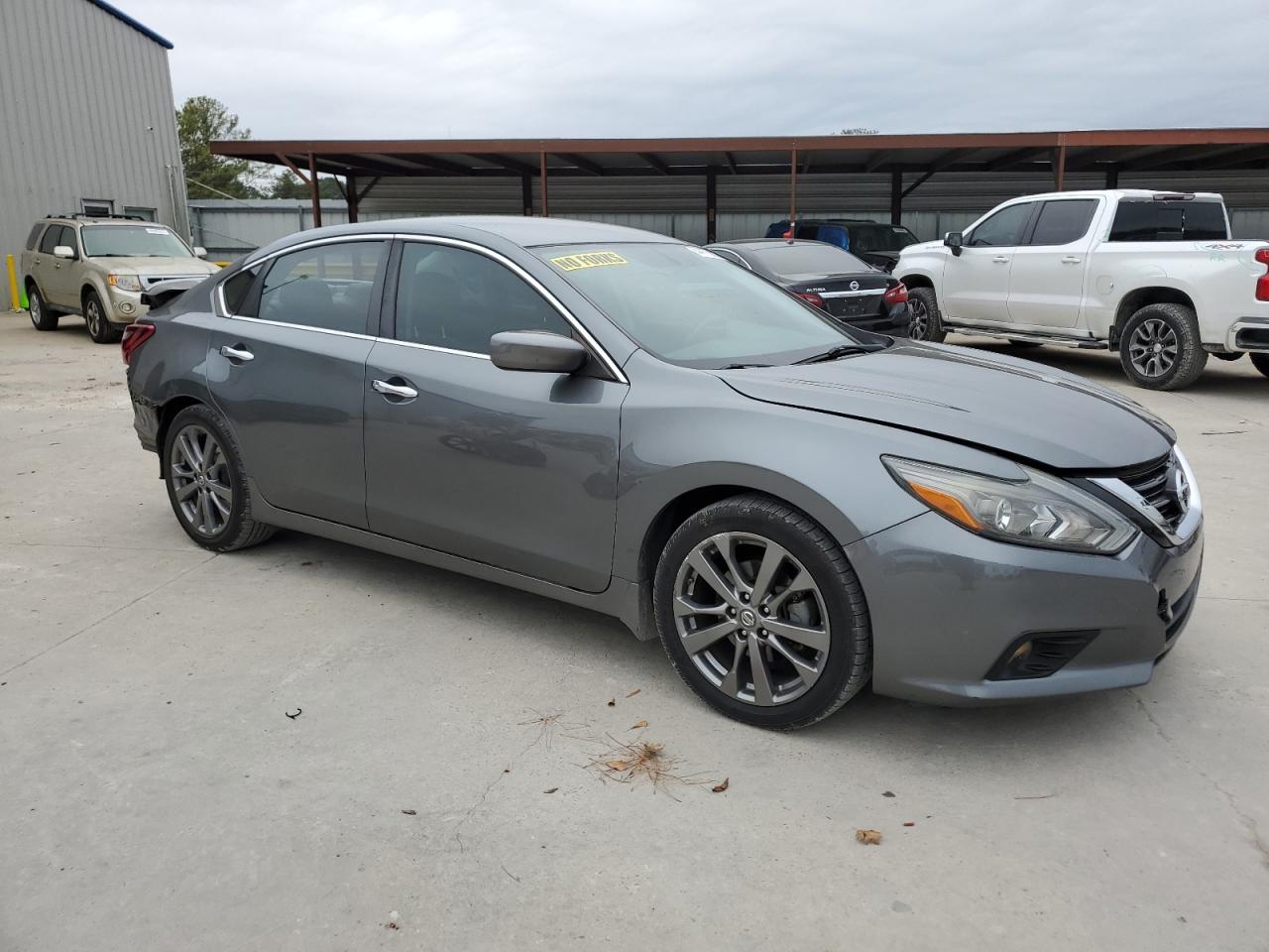 2018 Nissan Altima VIN 1N4AL3AP9JC153426 Copart auction photo, rear end / minor dent/scratches damage thumbnail 4