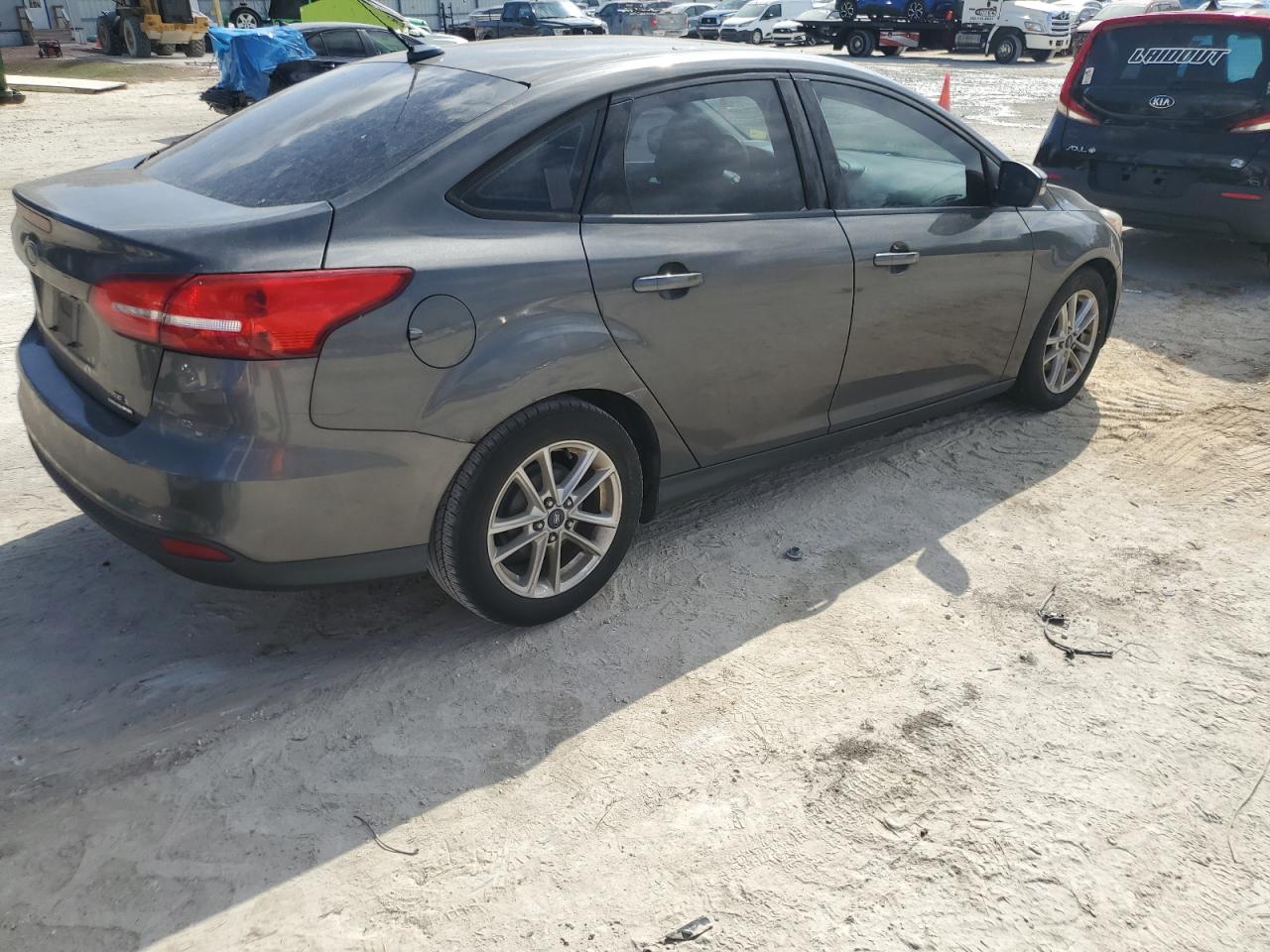 2016 Ford Focus VIN 1FADP3F23GL276646 Copart auction photo, normal wear / minor dent/scratches damage thumbnail 3