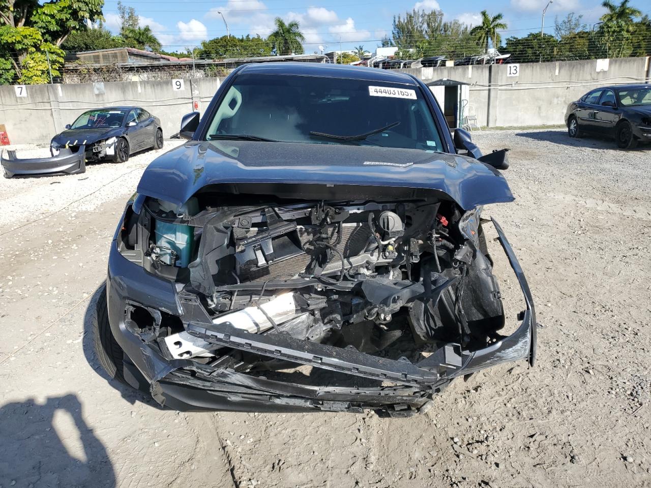 2022 Toyota Tacoma VIN 3TYAX5GN2NT039096 Copart auction photo, front end / rear end damage thumbnail 5