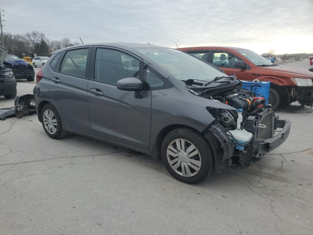 2016 Honda Fit VIN JHMGK5H51GX034857 Copart auction photo, front end / minor dent/scratches damage thumbnail 4