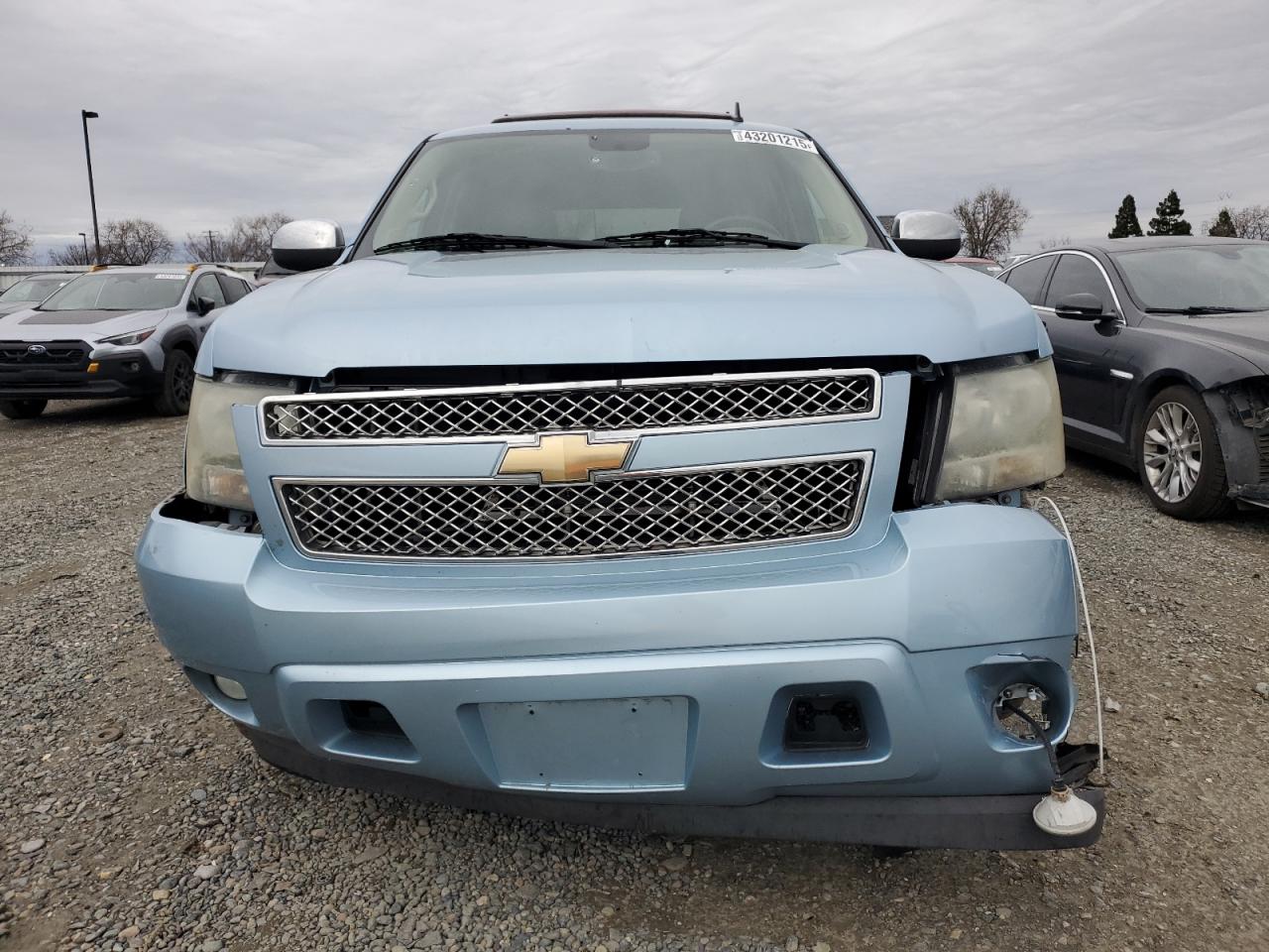 2011 Chevrolet Tahoe VIN 1GNSCCE09BR276970 Copart auction photo, front end / rear end damage thumbnail 5