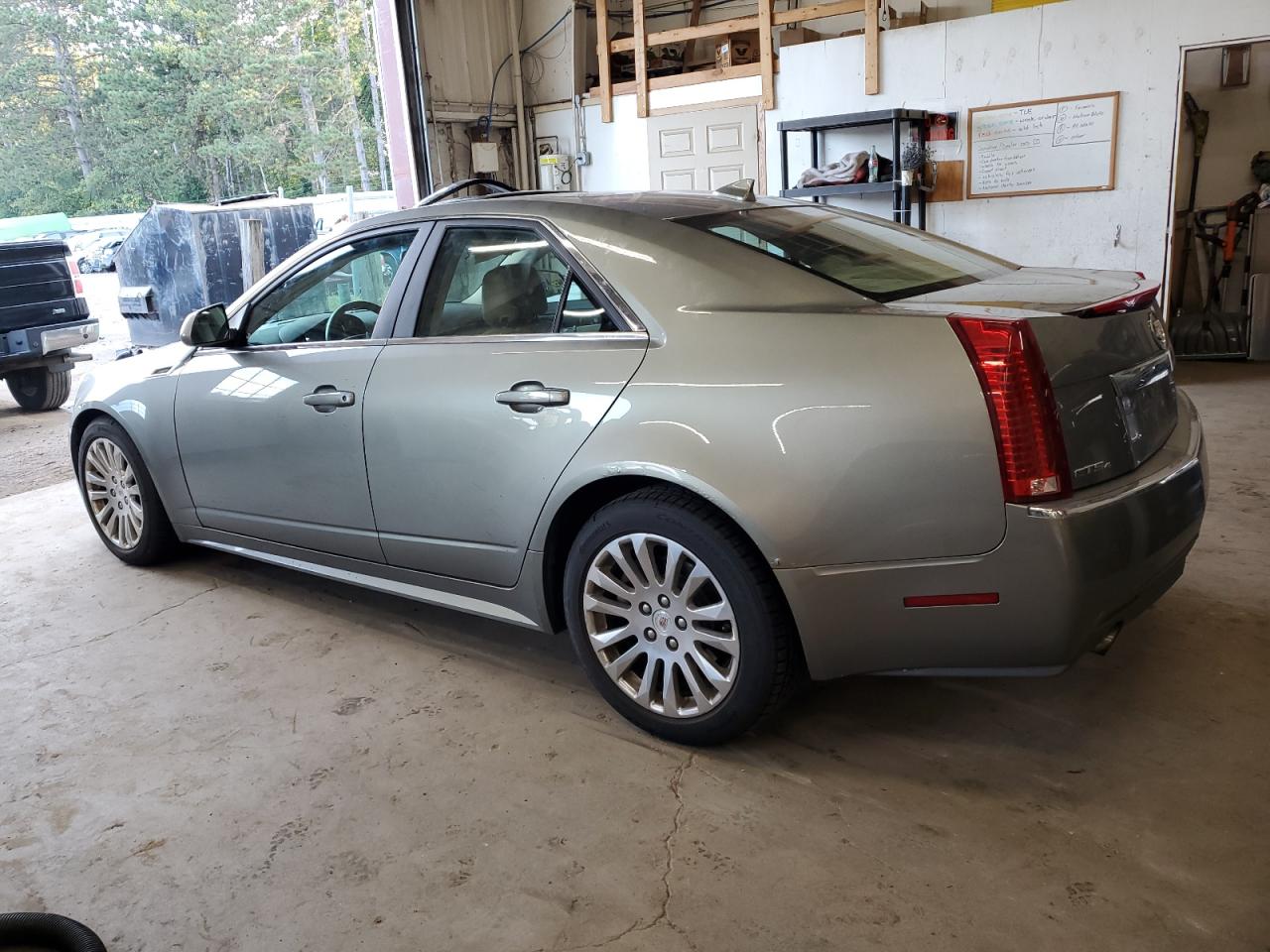 2011 Cadillac CTS VIN 1G6DM5EYXB0131329 Copart auction photo, vandalism / top/roof damage thumbnail 2