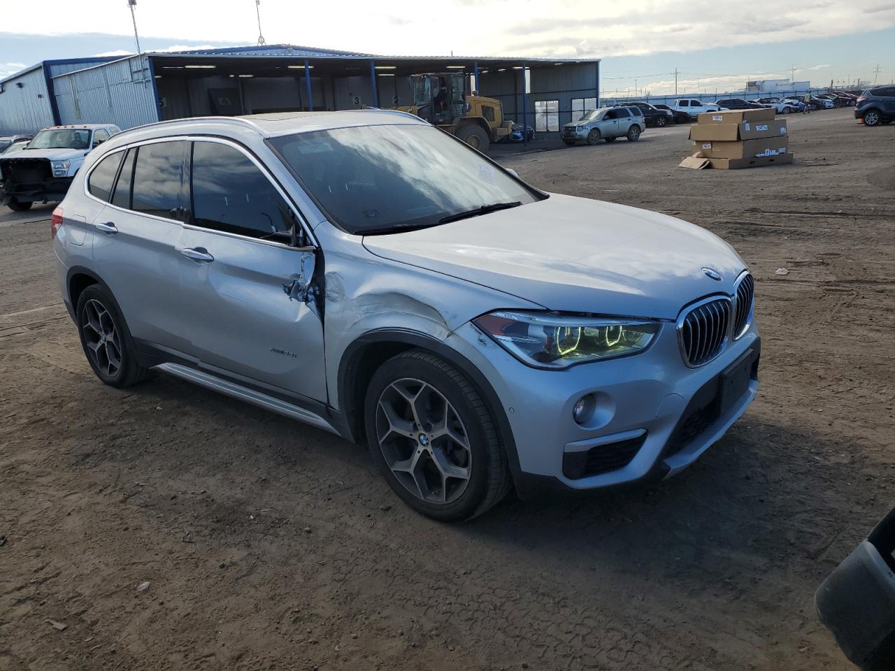 2016 BMW X1 VIN WBXHT3C37GP884928 Copart auction photo, front end damage thumbnail 4