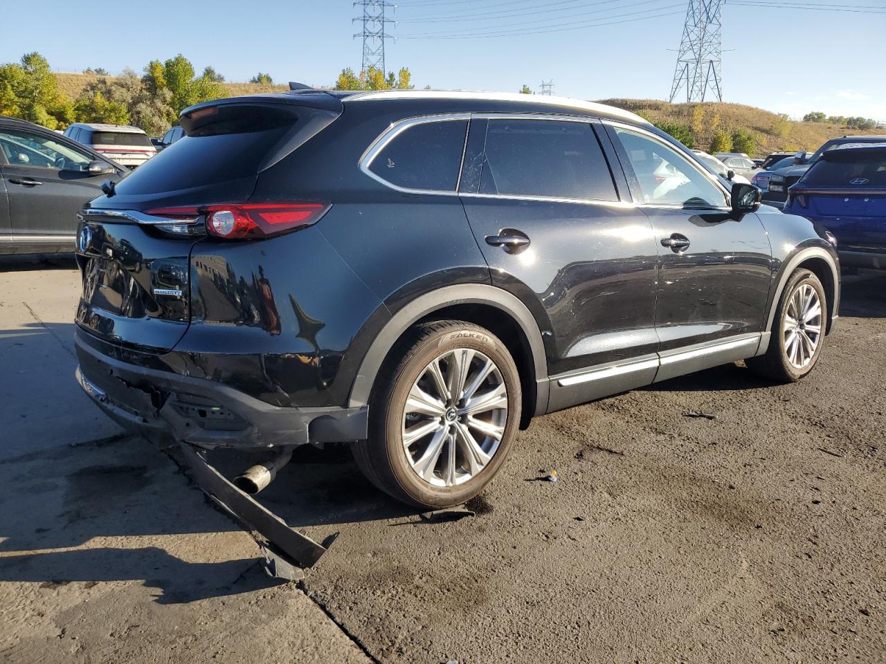 2021 Mazda CX-9 VIN JM3TCBEY9M0521875 Copart auction photo, front end / side damage thumbnail 3