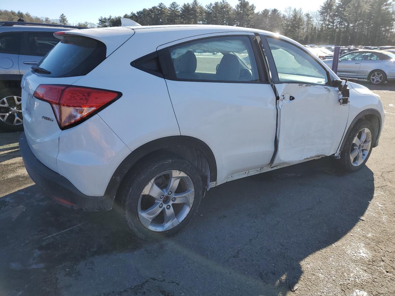 2018 Honda HR-V VIN 3CZRU6H31JM721918 Copart auction photo, side / minor dent/scratches damage thumbnail 3