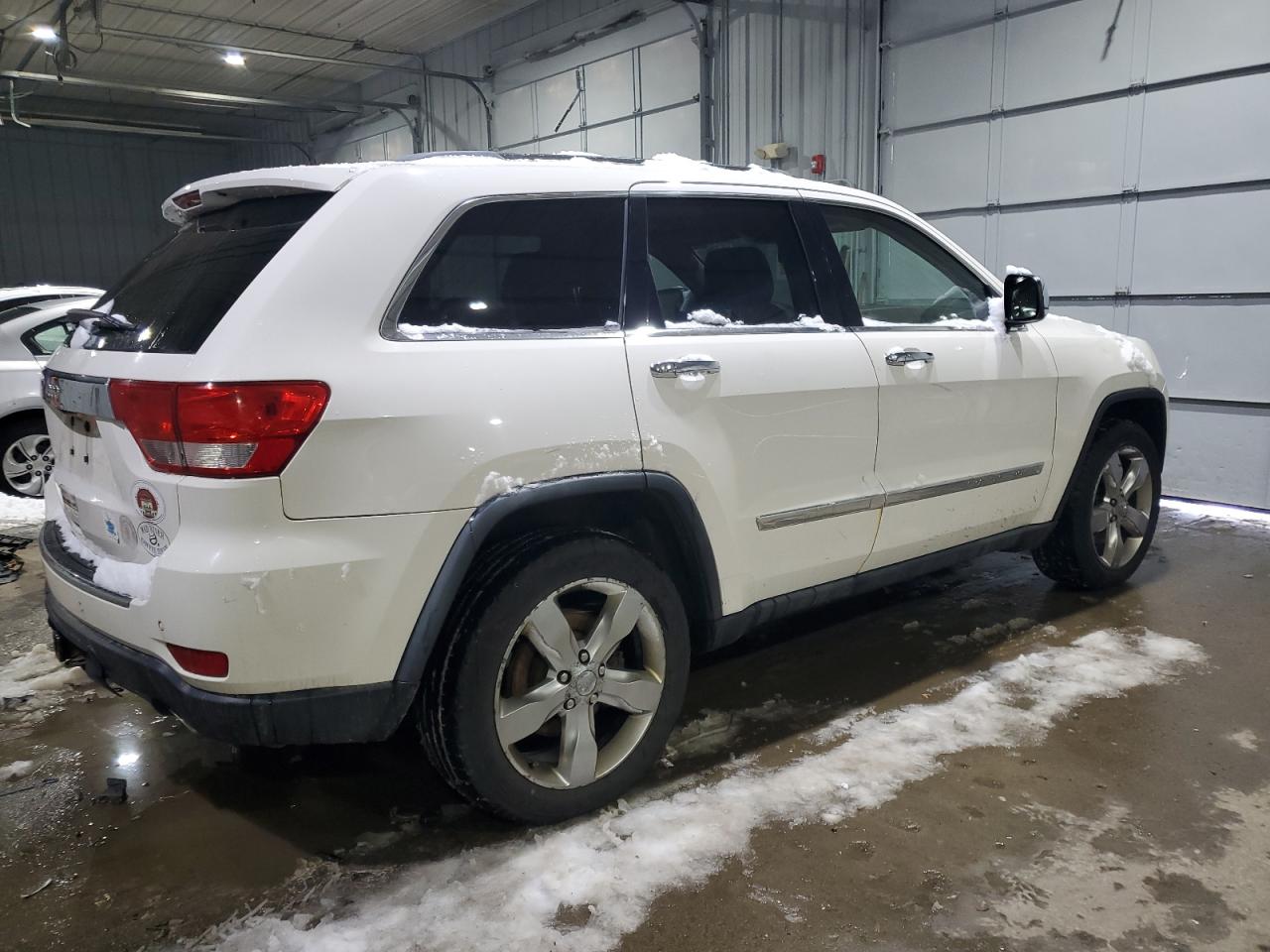 2011 Jeep Grand Cherokee VIN 1J4RR6GT0BC652449 Copart auction photo, side / minor dent/scratches damage thumbnail 3