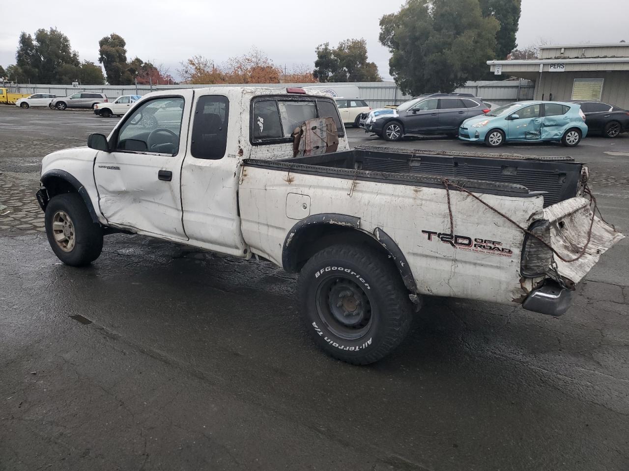 1999 Toyota Tacoma VIN 4TASM92N1XZ443348 Copart auction photo, all over damage thumbnail 2