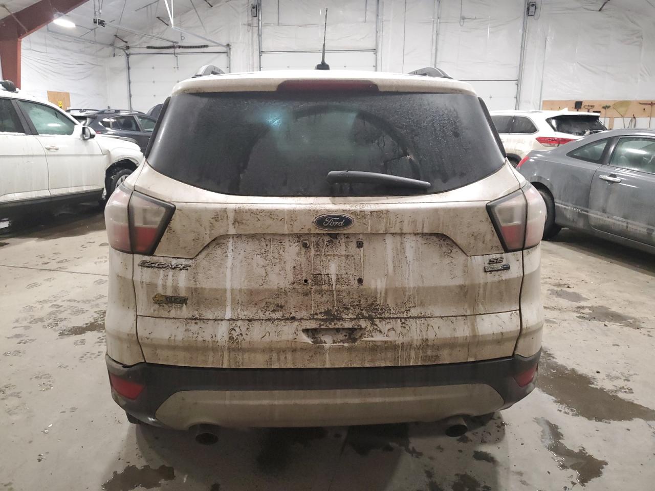 2017 Ford Escape VIN 1FMCU9GD8HUB33670 Copart auction photo, side / rear end damage thumbnail 6