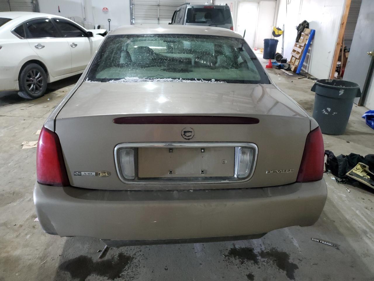 2004 Cadillac De Ville VIN 1G6KD54Y24U233633 Copart auction photo, all over damage thumbnail 6