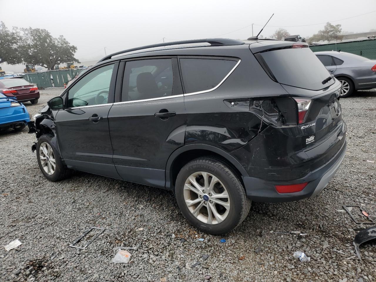 2017 Ford Escape VIN 1FMCU0GD0HUD85781 Copart auction photo, all over damage thumbnail 2