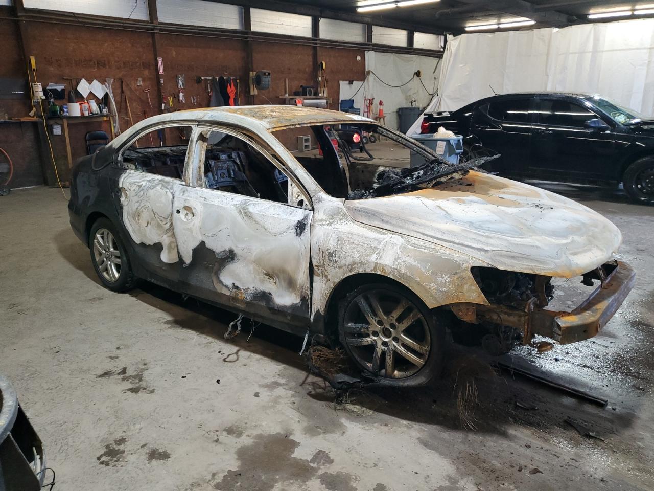 2015 Volkswagen Jetta VIN 3VW2K7AJ2FM210752 Copart auction photo, burn damage thumbnail 4