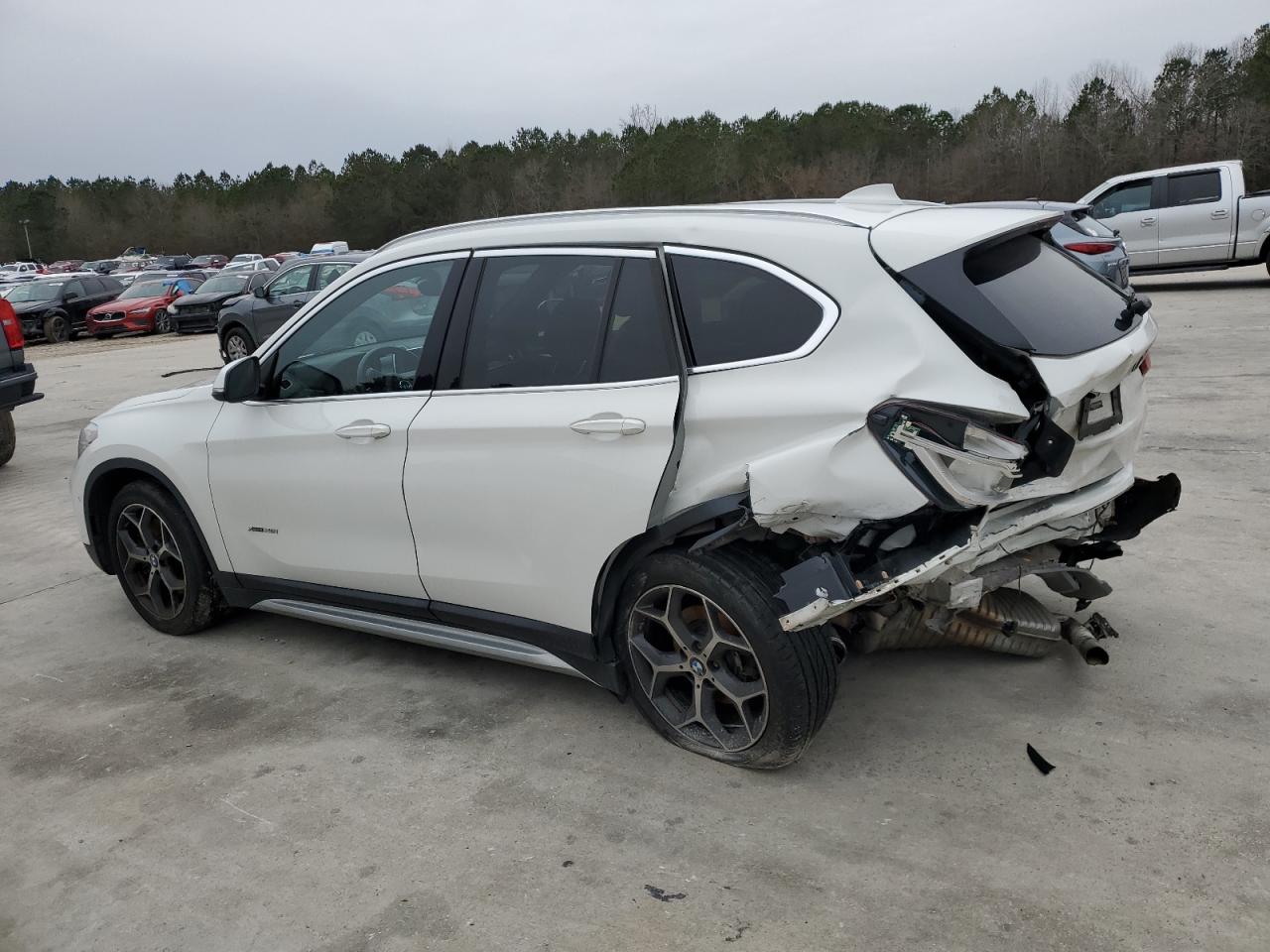 2016 BMW X1 VIN WBXHT3C31G5E50647 Copart auction photo, rear end / front end damage thumbnail 2