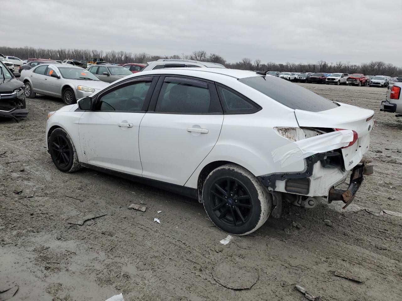 2018 Ford Focus VIN 1FADP3F21JL231261 Copart auction photo, rear end / minor dent/scratches damage thumbnail 2