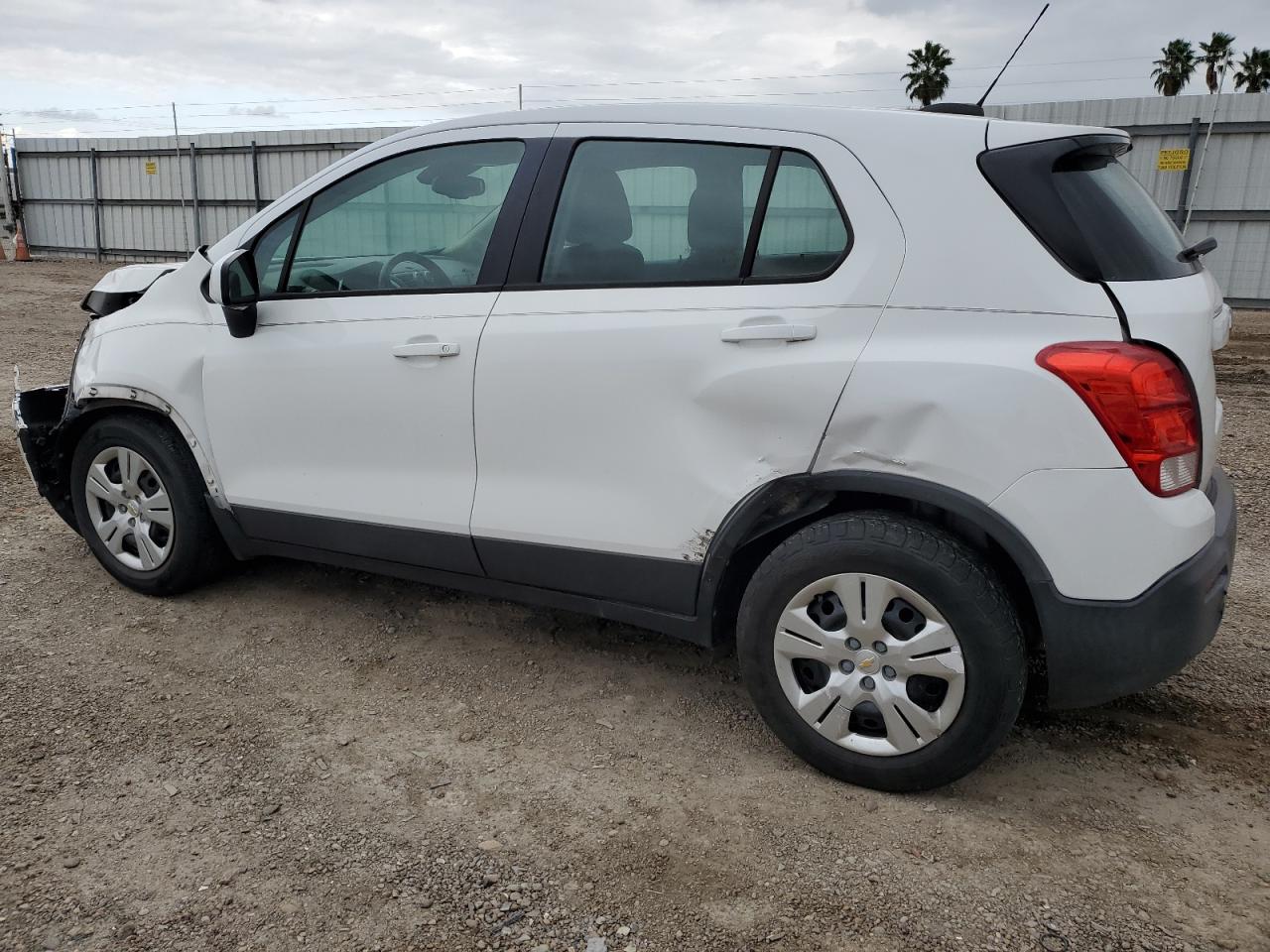 2015 Chevrolet Trax VIN 3GNCJKSB0FL242245 Copart auction photo, front end / rear end damage thumbnail 2