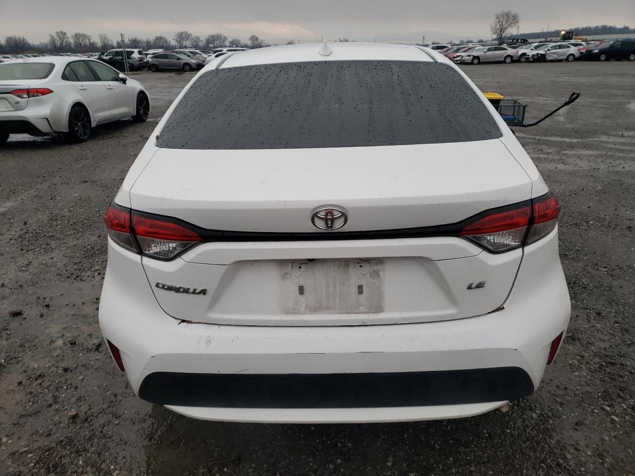 2021 Toyota Corolla VIN 5YFEPMAE3MP165023 Copart auction photo, side / front end damage thumbnail 6