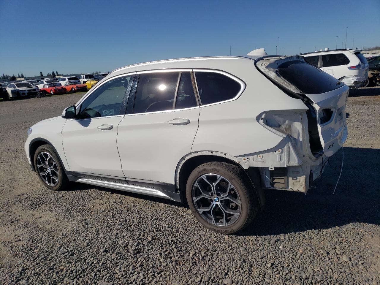 2020 BMW X1 VIN WBXJG7C09L5P28561 Copart auction photo, rear end damage thumbnail 2