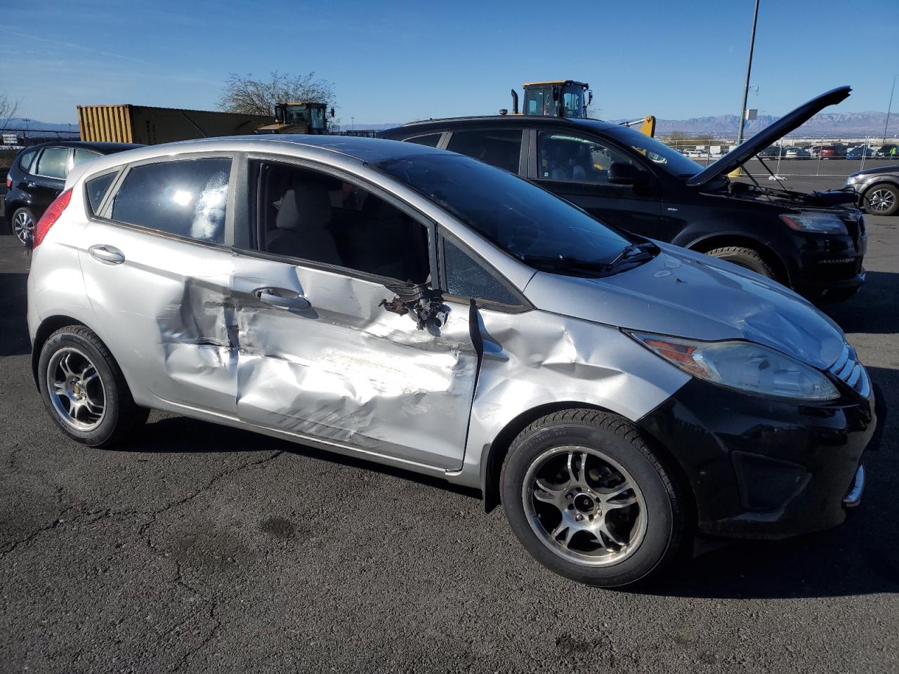 2013 Ford Fiesta VIN 3FADP4EJ7DM205409 Copart auction photo, side / front end damage thumbnail 4