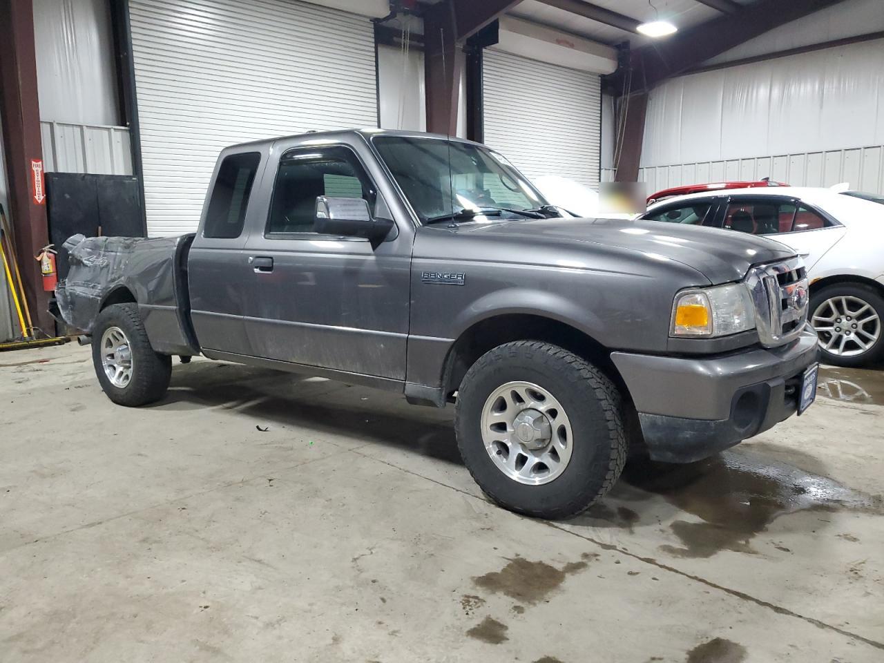 2011 Ford Ranger VIN 1FTLR4FEXBPA93052 Copart auction photo, side / rear end damage thumbnail 4