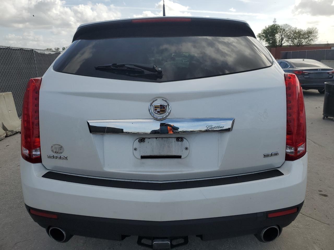 2013 Cadillac SRX VIN 3GYFNAE35DS532454 Copart auction photo, minor dent/scratches damage thumbnail 6