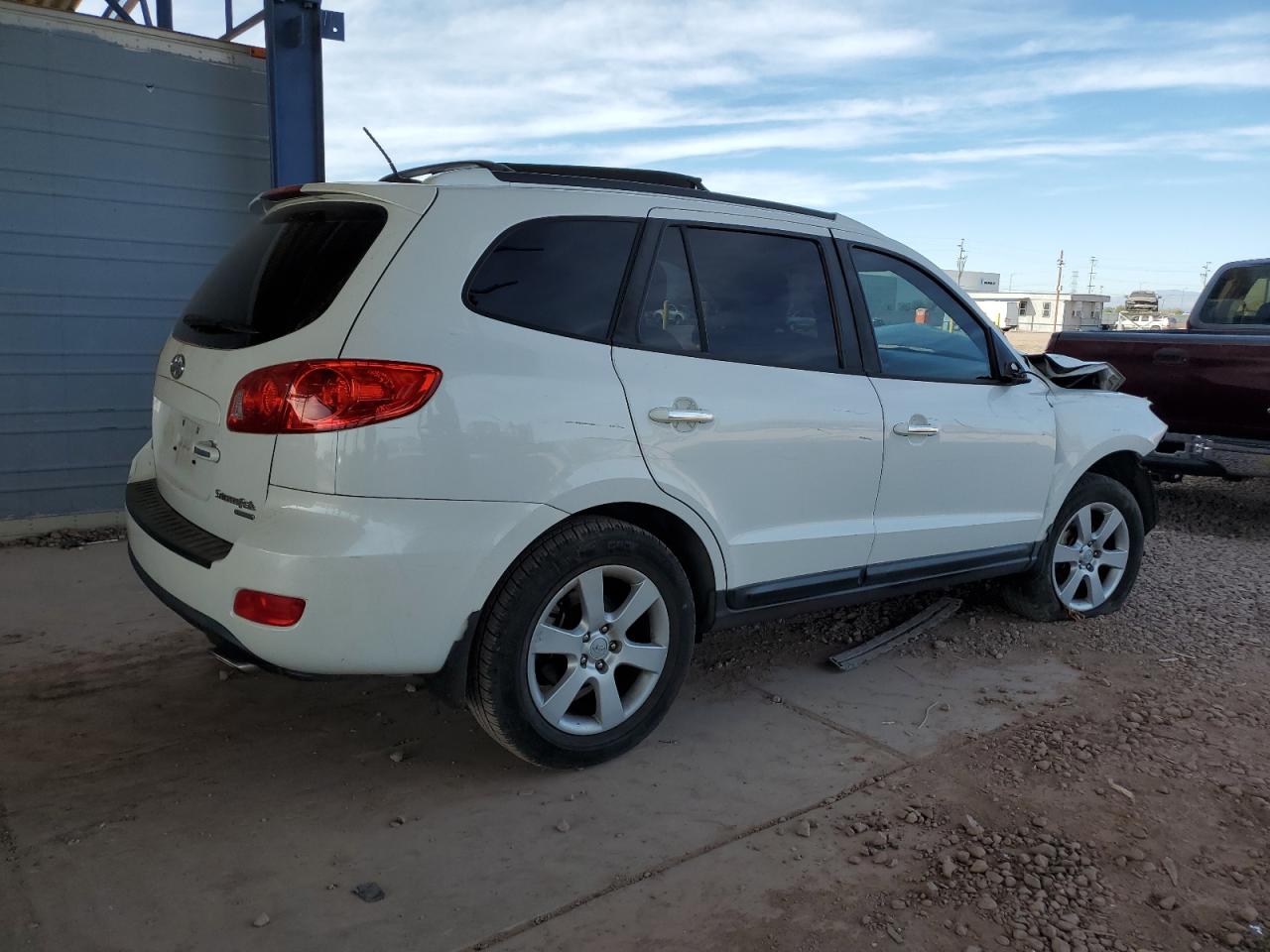 2009 Hyundai Santa Fe VIN 5NMSH13E69H313937 Copart auction photo, front end / side damage thumbnail 3