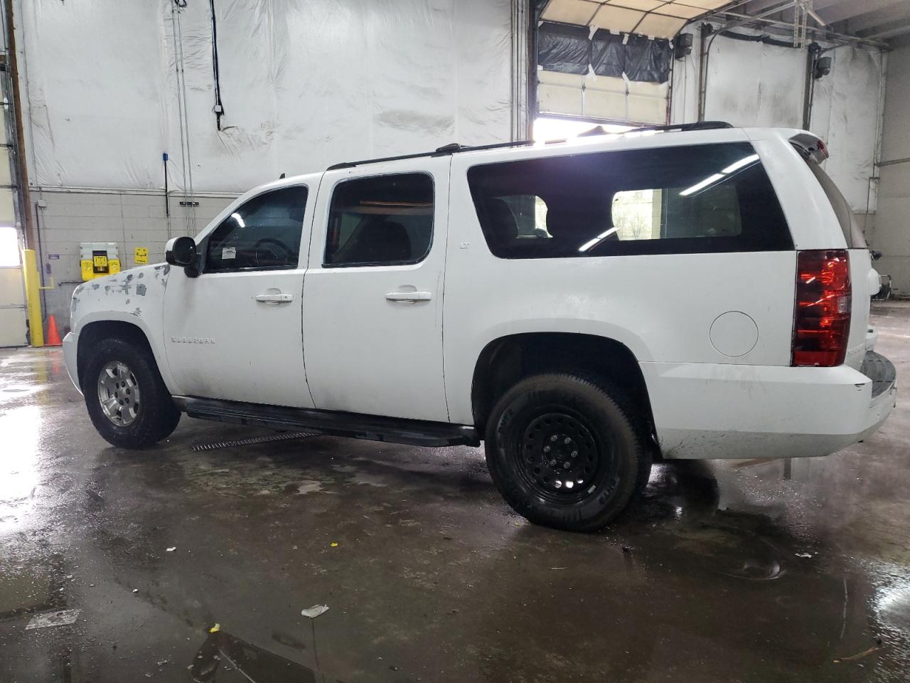 2012 Chevrolet Suburban VIN 1GNSKJE7XCR179086 Copart auction photo, vandalism / hail damage thumbnail 2