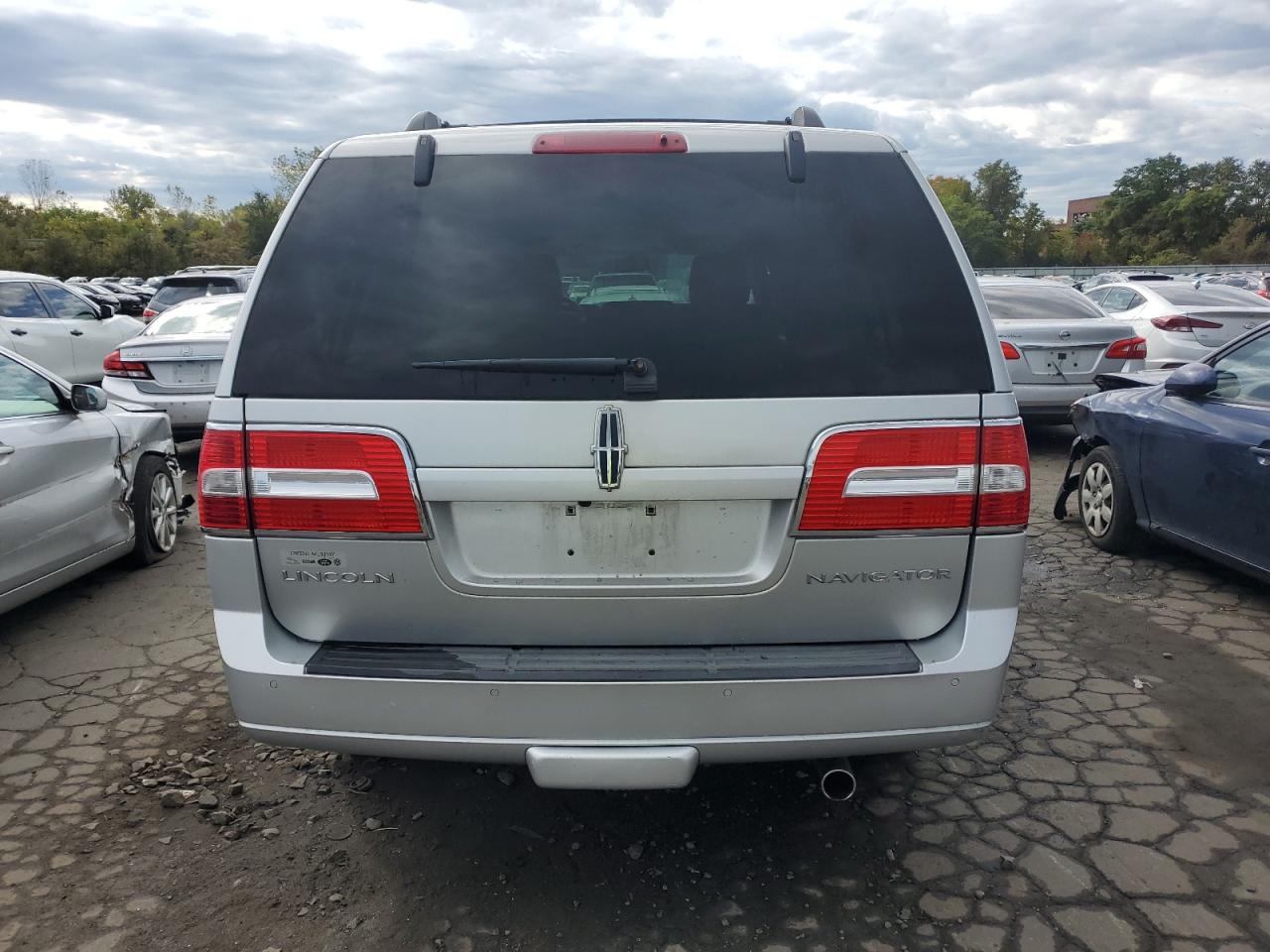2012 Lincoln Navigator VIN 5LMJJ3H59CEL03099 Copart auction photo, side / minor dent/scratches damage thumbnail 6