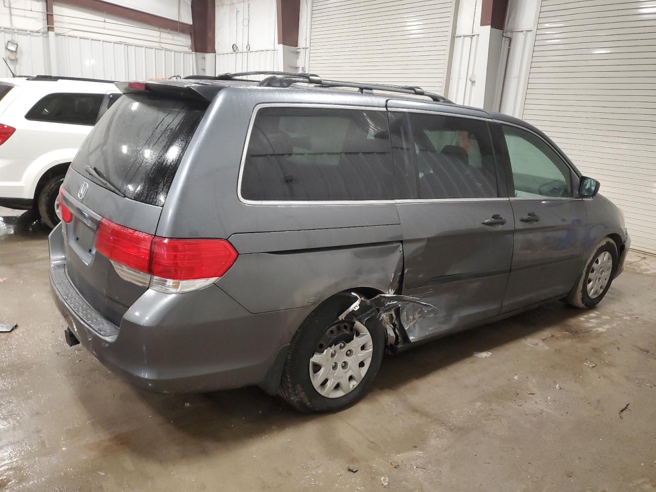 2010 Honda Odyssey VIN 5FNRL3H21AB046977 Copart auction photo, side / rear end damage thumbnail 3