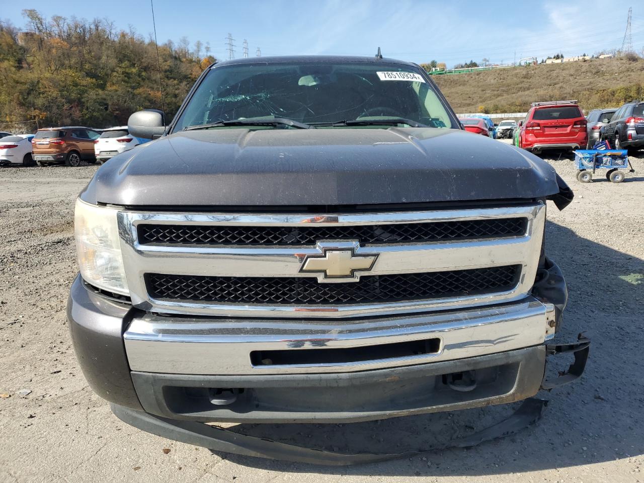 2010 Chevrolet Silverado VIN 1GCSKREA4AZ113214 Copart auction photo, side / front end damage thumbnail 5