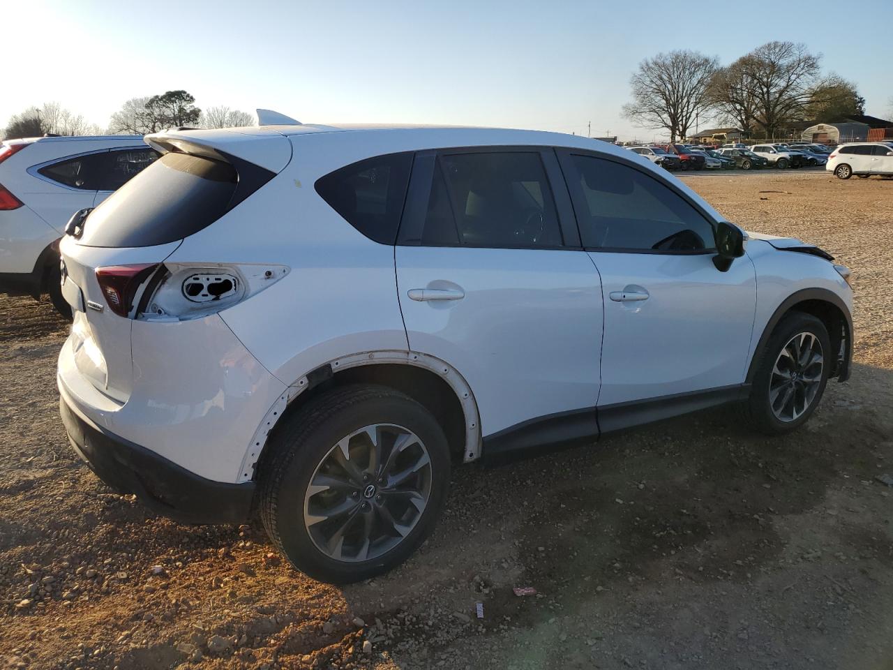 2016 Mazda CX-5 VIN JM3KE2DY3G0853550 Copart auction photo, rear end / front end damage thumbnail 3