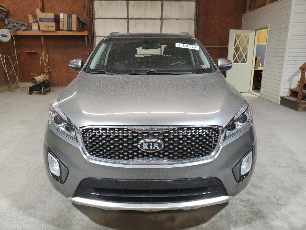 2016 KIA Sorento VIN 5XYPKDA59GG031228 Copart auction photo, rear end damage thumbnail 5
