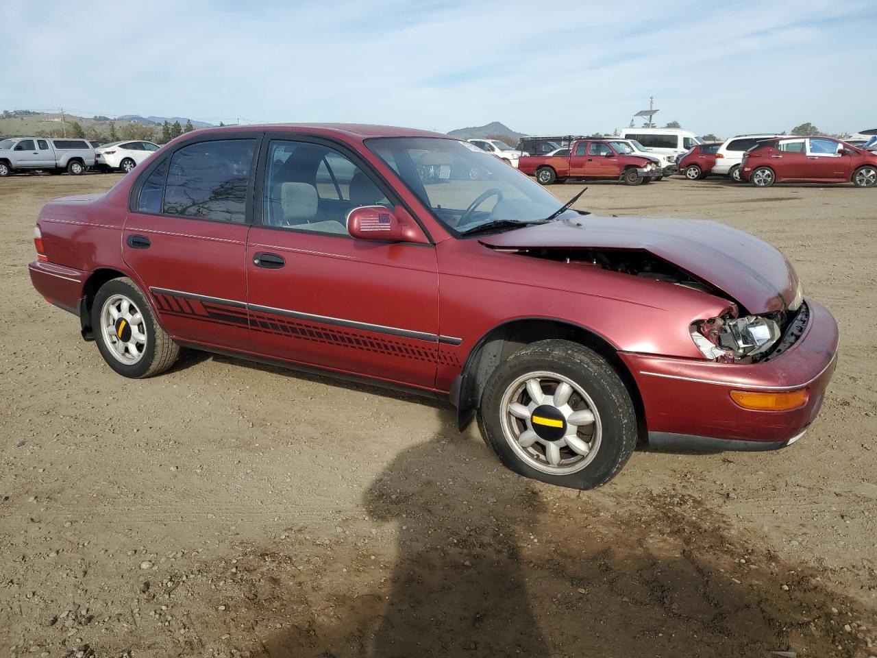 1997 Toyota Corolla VIN 1NXBB02E1VZ633551 Copart auction photo, front end damage thumbnail 4