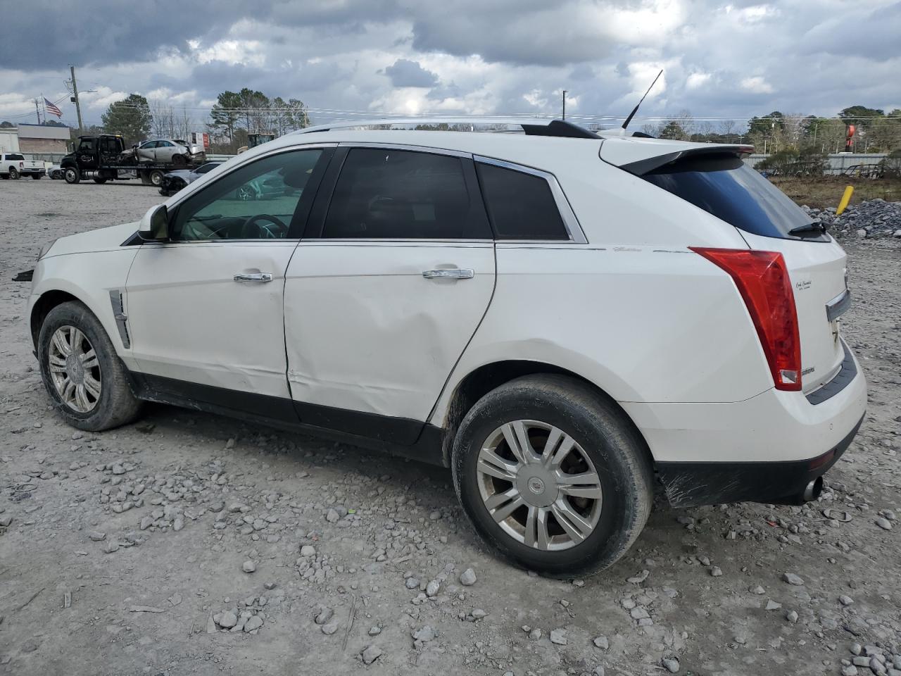 2010 Cadillac SRX VIN 3GYFNAEY0AS568186 Copart auction photo, side damage thumbnail 2
