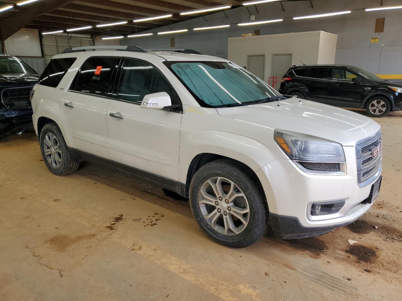 2015 GMC Acadia VIN 1GKKVRKD4FJ107512 Copart auction photo, water/flood damage thumbnail 4