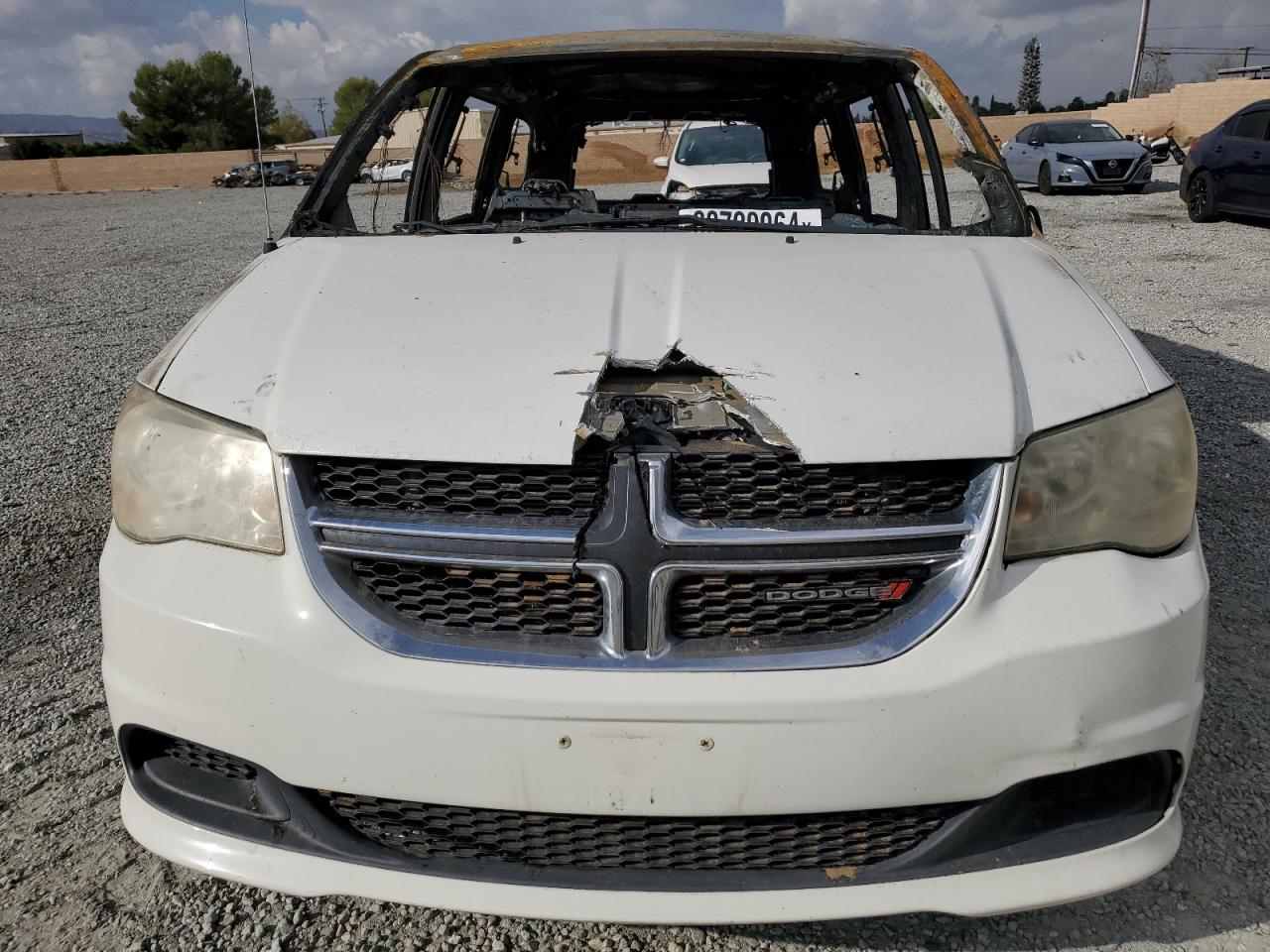 2012 Dodge Caravan VIN 2C4RDGCGXCR262843 Copart auction photo, burn damage thumbnail 5