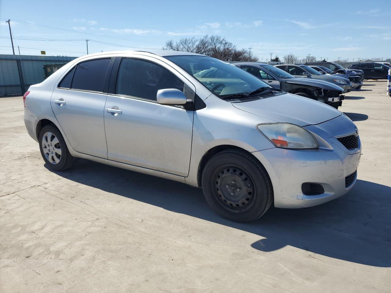 2012 Toyota Yaris VIN JTDBT4K32CL019988 Copart auction photo, rear end damage thumbnail 4