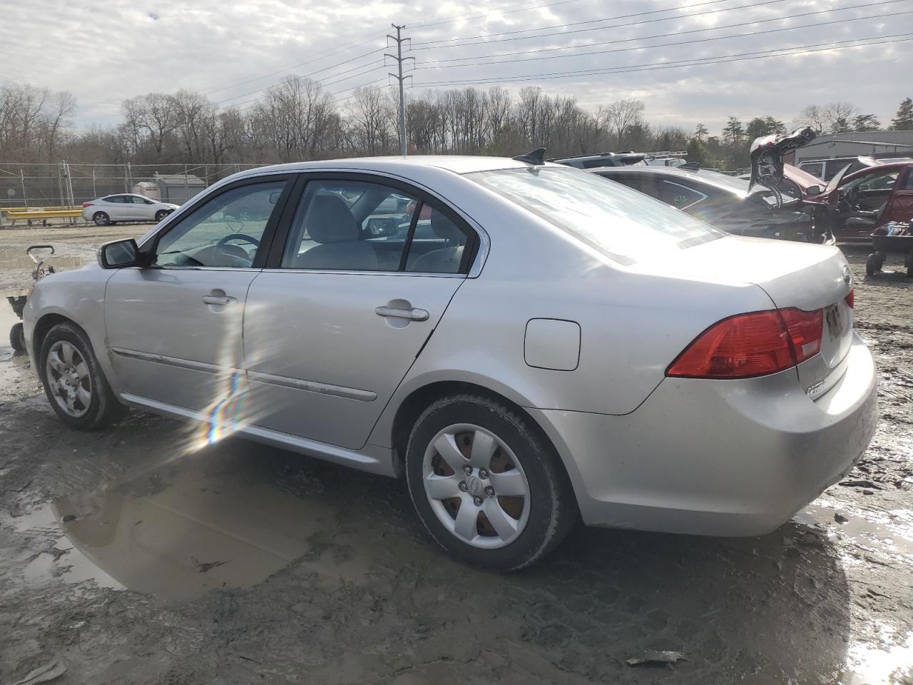 2009 KIA Optima VIN KNAGE228295309755 Copart auction photo, side damage thumbnail 2